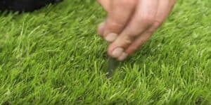 laying artificial grass in uneven ground